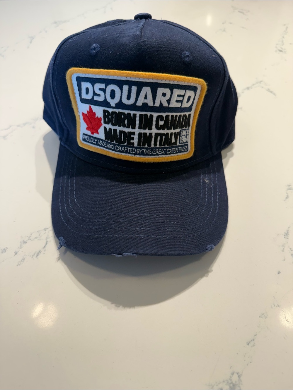 DSQUARED Navy Cap with Yellow Trim and Red Maple Patch